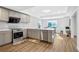 Modern kitchen featuring stainless steel appliances, sleek countertops, and neutral-toned cabinetry at 4030 Greatwood Path, Alpharetta, GA 30005