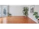 Bright living room with hardwood floors, natural light, and neutral paint at 4030 Greatwood Path, Alpharetta, GA 30005