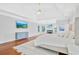 Spacious main bedroom boasts hardwood floors, recessed lighting, and a tray ceiling at 4030 Greatwood Path, Alpharetta, GA 30005