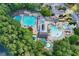 Aerial shot highlighting a well-equipped pool area with a variety of pools and many amenities for residents at 4030 Greatwood Path, Alpharetta, GA 30005