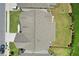 Birds-eye view of a home's roof, driveway, and fenced-in backyard at 4189 Brookmont Way, Auburn, GA 30011
