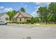 Exterior view of the community clubhouse with designated parking spaces at 4189 Brookmont Way, Auburn, GA 30011