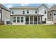 Well-maintained backyard with a covered patio area, ideal for entertaining guests and enjoying outdoor living at 4189 Brookmont Way, Auburn, GA 30011