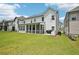 Spacious backyard with a patio, providing ample room for outdoor fun and relaxation at 4189 Brookmont Way, Auburn, GA 30011