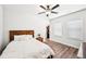 Cozy bedroom featuring a comfortable bed, neutral walls, ample natural light, and a closet for organized storage at 4189 Brookmont Way, Auburn, GA 30011