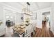 Charming dining room featuring hardwood floors and ample natural light, perfect for hosting meals at 4189 Brookmont Way, Auburn, GA 30011