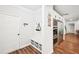 Entryway with mudroom area, storage and direct access to modern kitchen at 4189 Brookmont Way, Auburn, GA 30011