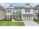 Charming two-story home with a covered front porch, a well-manicured lawn, and a welcoming curb appeal at 4189 Brookmont Way, Auburn, GA 30011