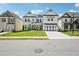 Beautiful two-story home with a manicured lawn, long driveway and welcoming curb appeal at 4189 Brookmont Way, Auburn, GA 30011