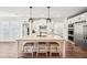 Spacious kitchen with a large island, stainless appliances, and modern finishes at 4189 Brookmont Way, Auburn, GA 30011