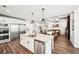 This contemporary kitchen features stainless steel appliances and an open floorplan at 4189 Brookmont Way, Auburn, GA 30011