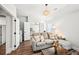 Well-lit living space with access to other rooms and a comfortable, relaxing atmosphere at 4189 Brookmont Way, Auburn, GA 30011