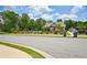 Beautiful community clubhouse and pool area with surrounding green space at 4189 Brookmont Way, Auburn, GA 30011