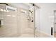 Modern glass shower with built in bench and dual shower heads at 4189 Brookmont Way, Auburn, GA 30011