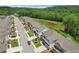View of a neighborhood street with houses, sidewalks, and landscaping at 4189 Brookmont Way, Auburn, GA 30011
