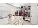 Spacious walk-in closet with custom storage solutions and a central island at 4189 Brookmont Way, Auburn, GA 30011