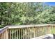 Backyard view showing a wood railing overlooking the landscape at 4240 N Braves Cir, Douglasville, GA 30135