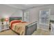 Bedroom with a neutral color scheme, carpeted floor and natural light at 4240 N Braves Cir, Douglasville, GA 30135