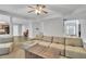 Spacious living room with hardwood floors, ample seating and ceiling fan at 4240 N Braves Cir, Douglasville, GA 30135