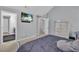 Serene main bedroom showcasing a modern bed with an en-suite bathroom at 4240 N Braves Cir, Douglasville, GA 30135