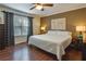 Relaxing bedroom with hardwood floors, stylish decor, and a window at 224 Amy Blvd, Temple, GA 30179