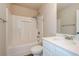 Clean, bright bathroom with a shower-tub combination and a single vanity with modern finishes at 3405 Linstead Ct, Loganville, GA 30052