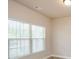 Cozy bedroom with a large window providing natural light and blinds for privacy at 3405 Linstead Ct, Loganville, GA 30052