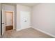 Bedroom features neutral walls, carpet, and closet doors at 3405 Linstead Ct, Loganville, GA 30052