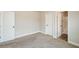Spacious bedroom with neutral walls and carpet and access to an ensuite bathroom at 3405 Linstead Ct, Loganville, GA 30052