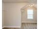 Walk-in closet providing ample storage with shelving and natural lighting at 3405 Linstead Ct, Loganville, GA 30052