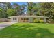Charming single story brick home with manicured lawn, driveway, and welcoming, cozy feel at 470 Pretty View Se Ln, Smyrna, GA 30082