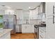 Updated kitchen with stainless steel appliances, granite countertops, and ample storage at 470 Pretty View Se Ln, Smyrna, GA 30082