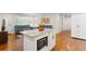 Open concept kitchen with stainless appliances and seamless flow to living and dining areas at 470 Pretty View Se Ln, Smyrna, GA 30082