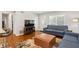 Open concept living room featuring hardwood floors, lots of natural light, and neutral decor at 470 Pretty View Se Ln, Smyrna, GA 30082
