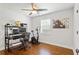 Office featuring hardwood floors, modern decor, and an exercise bike at 470 Pretty View Se Ln, Smyrna, GA 30082