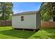 Backyard storage shed with good condition siding and roof, ideal for keeping your tools and equipment secure at 470 Pretty View Se Ln, Smyrna, GA 30082
