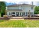 Cozy backyard deck with outdoor seating and a grill, perfect for entertaining guests at 2000 Settindown Dr, Roswell, GA 30075