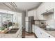 Well-equipped kitchen features stainless appliances, granite countertops, and views of the dining area at 2000 Settindown Dr, Roswell, GA 30075