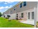 Townhome features a back patio and lawn for outdoor enjoyment at 2555 Flat Shoals Rd # 2006, Atlanta, GA 30349