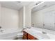 Bathroom features a large mirror and combo tub and shower at 2555 Flat Shoals Rd # 2006, Atlanta, GA 30349