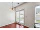 A dining area features wood floors, bright windows and direct access to the backyard at 2555 Flat Shoals Rd # 2006, Atlanta, GA 30349