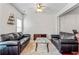 A spacious living room is furnished with plush sofas and a shag rug at 2555 Flat Shoals Rd # 2006, Atlanta, GA 30349