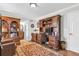 Office with dark wood furniture, rug, and access to the bathroom at 420 Heritage Park Nw Trce # 22, Kennesaw, GA 30144