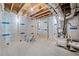 Unfinished basement with exposed ducts, wood beams, and insulated walls presents versatile potential at 461 Maypop Ln, Woodstock, GA 30188