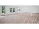 Large unfinished basement with an egress window at 461 Maypop Ln, Woodstock, GA 30188