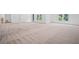 Expansive unfinished basement with large windows and natural light at 461 Maypop Ln, Woodstock, GA 30188