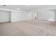 Spacious unfinished basement with support columns, perfect for customization at 461 Maypop Ln, Woodstock, GA 30188