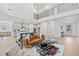 Spacious open concept living area with kitchen, eat-in and view to the front of the house at 461 Maypop Ln, Woodstock, GA 30188
