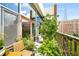 Inviting balcony with seating, plants, and views of historic buildings and towers at 845 Spring Nw St # Ph4, Atlanta, GA 30308