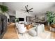 Large open-plan living room with modern furnishings and an open design concept leading into the kitchen at 845 Spring Nw St # Ph4, Atlanta, GA 30308